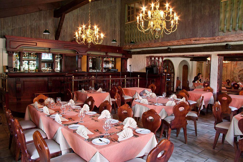 Hotel Chalet Tirol Heredia Restaurant bilde