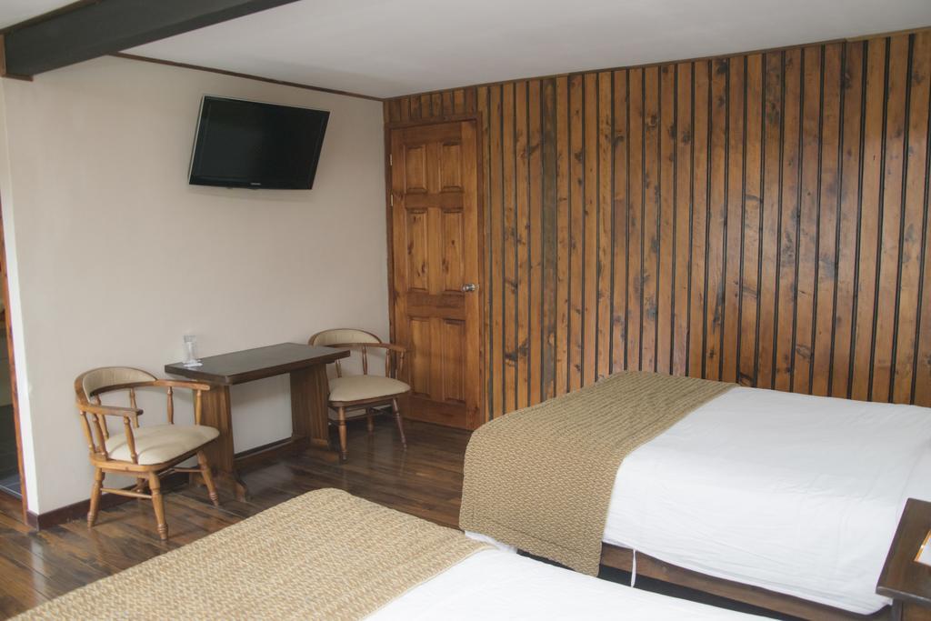 Hotel Chalet Tirol Heredia Rom bilde