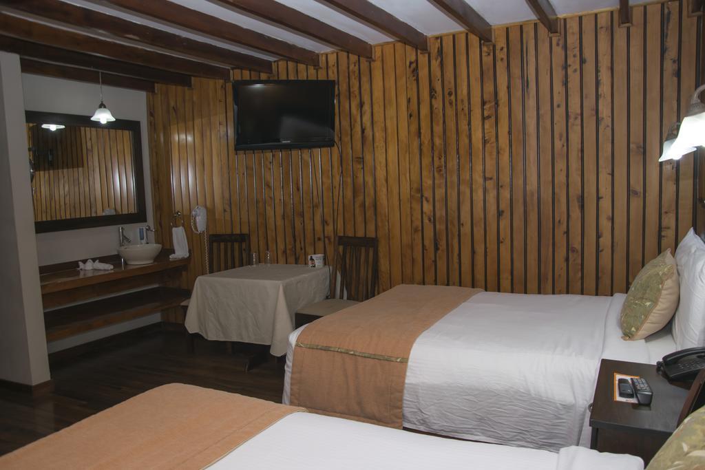 Hotel Chalet Tirol Heredia Rom bilde